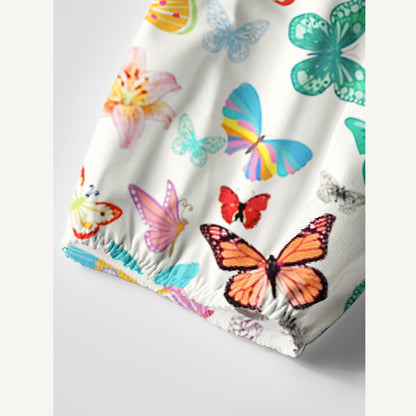 Rainbow Butterfly Garden Print Boho Tie‑Neck Smock Mini Dress